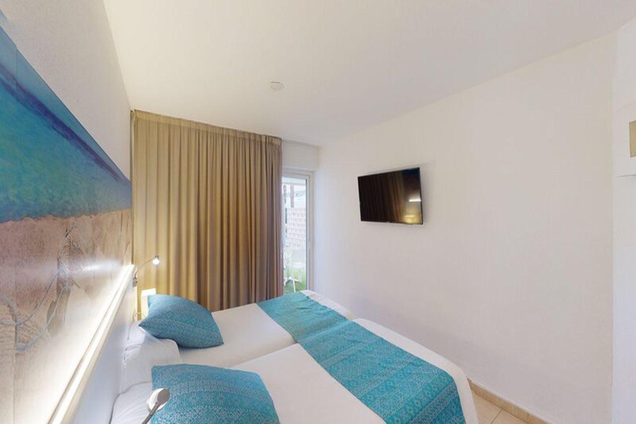 Aparthotel Tropic Garden Santa Eularia des Riu Esterno foto